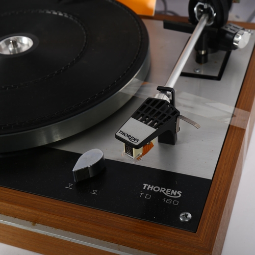 212 - THORENS - a TD160 turntable record player, plays both LPs and 7