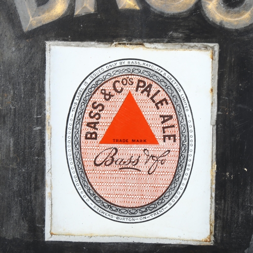 22 - BASS IN BOTTLE - a slate advertising panel for Bass & Company Pale Ale, 28 x 51cm, and a pressed bra... 