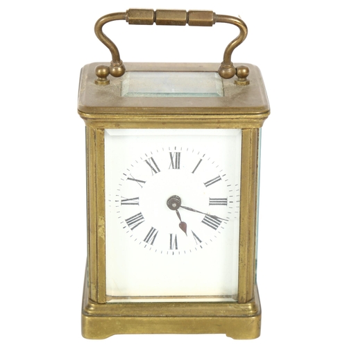 220 - A French brass-cased carriage clock, white enamel dial with Roman numerals and bevelled glass exhibi... 