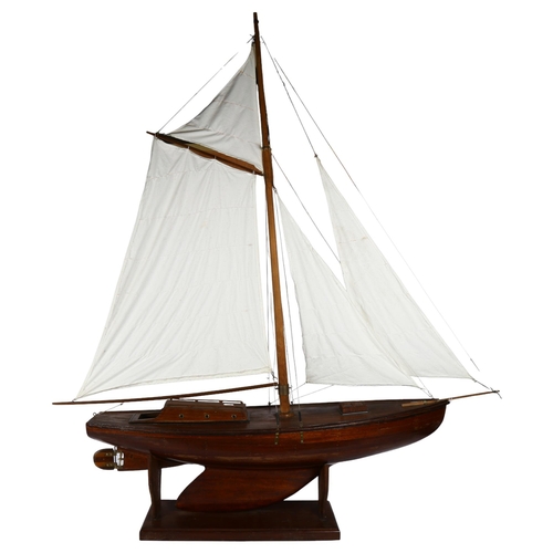 223 - A Vintage wooden-hulled scratch-built model pond yacht, hull length 90cm, overall height 130cm