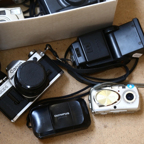 230 - A quantity of Vintage cameras and equipment, including a Canon AE-1, with 28mm lens, in carry case w... 