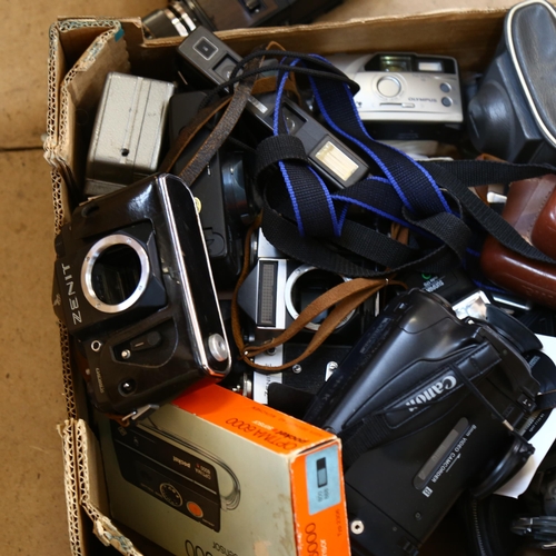 231 - A quantity of various Vintage cameras and equipment, including Canon, Optima, Halina, and various ot... 