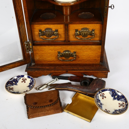 258 - A Victorian oak smoker's cabinet, with mixing bowl and various accessories, H43cm