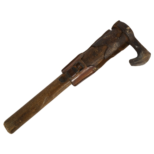 261 - A Vintage fireman's axe, stamp on axe undecipherable but appears to read Sheffield, markings on leat... 