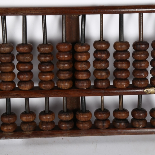 264 - A Chinese style brass banded abacus, L47cm, H18cm