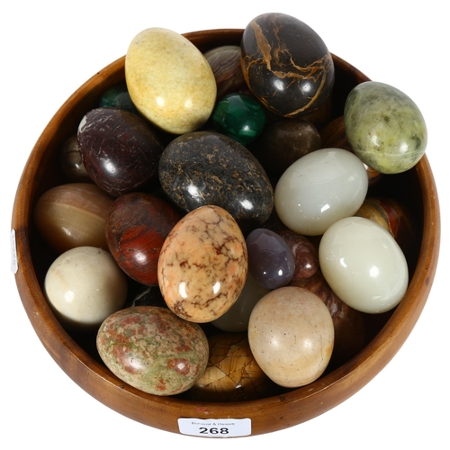 268 - A bowl of ornamental eggs of various sizes and dimensions, bowl diameter 26cm