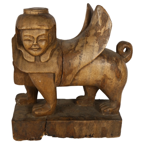 275 - A Chinese style hardwood carved figure of a mythical creature, H43cm, L36cm, W17cm