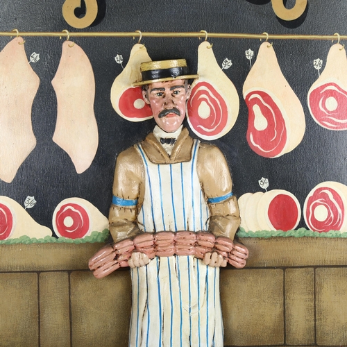 28 - A large carved and painted wood butcher's advertising sign 