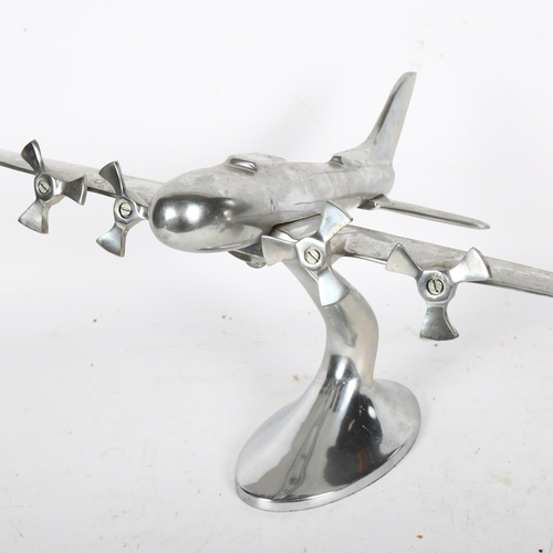 284 - A polished aluminium aeroplane ornament, with 4 propellers, H22cm, W49cm, L30cm