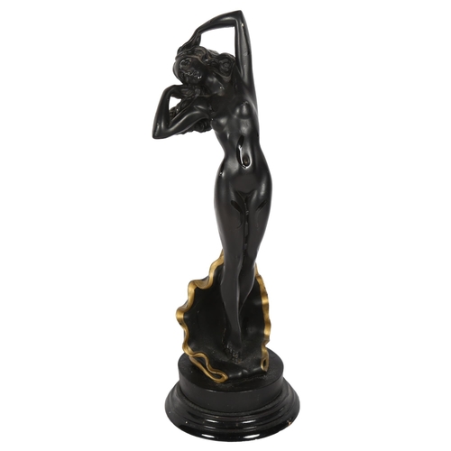 288 - A spelter figure on a base depicting a woman, nude standing in a shell, height including base 34cm