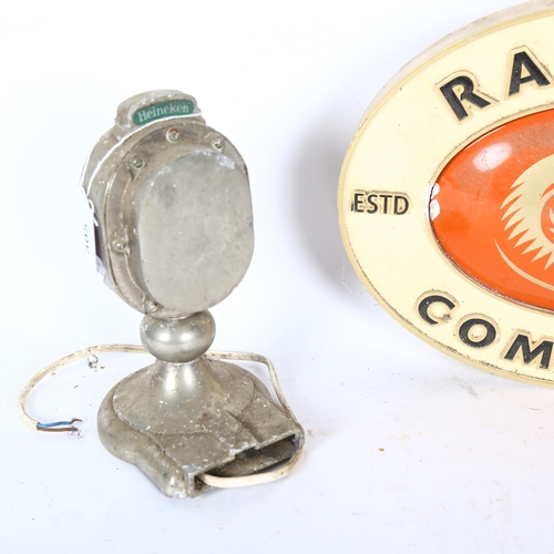 305 - A Vintage Heineken beer tap and metal sign, and a ceramic plaque advertising The Ram Pub Company, la... 