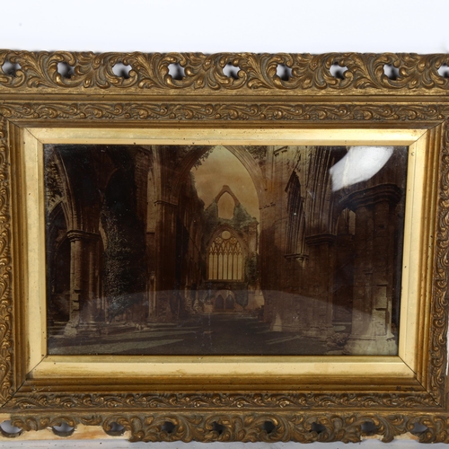 311 - A 19th century crystoleum print behind convex glass, Tintern Abbey, gesso frame, overall frame dimen... 