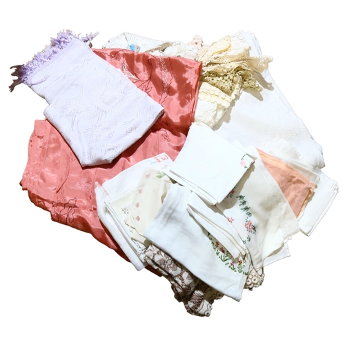 322 - A quantity of Vintage linen, including counter panes, mats, table cloths and doilies etc