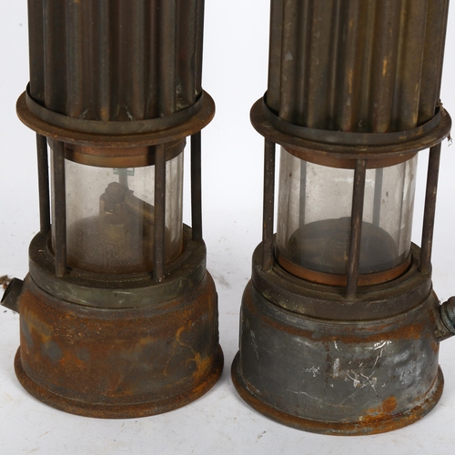 341 - 2 Antique metal miner's lamps, H27cm