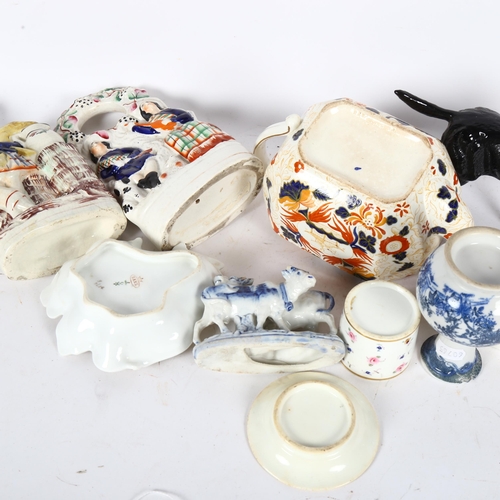 349 - A Royal Doulton Labrador, a Victorian teapot and Staffordshire figures, pen stand etc