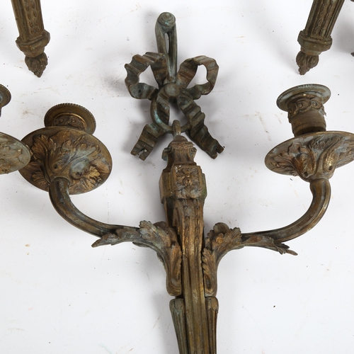 39 - A set of 4 Adams style cast gilt-bronze twin-branch wall lights, with acanthus leaf decoration, and ... 