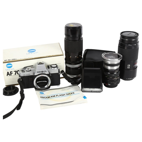 40 - A Minolta X-300 camera, together with a Canon lens FD200MM 1:4, a night vision deluxe super wide mac... 