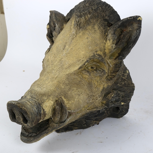 57 - A concrete study of a boar's head, H31cm, D33cm