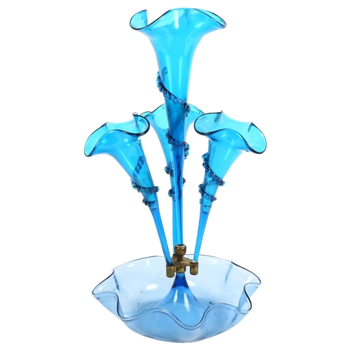 6 - A blue glass table epergne, with 4 trumpets, H48cm