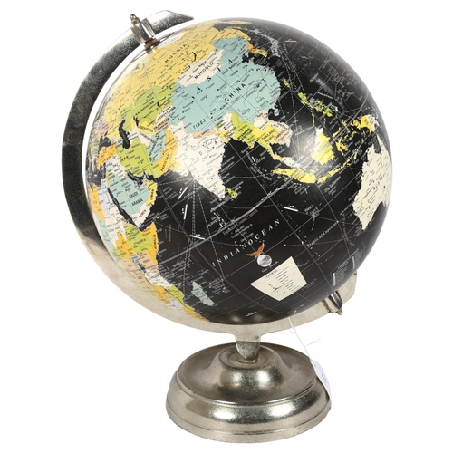 61 - A mid-century black ground terrestrial globe, on chromed stand, H42cm