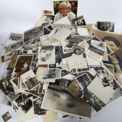 73 - A large quantity of photographs, including military, family snaps etc