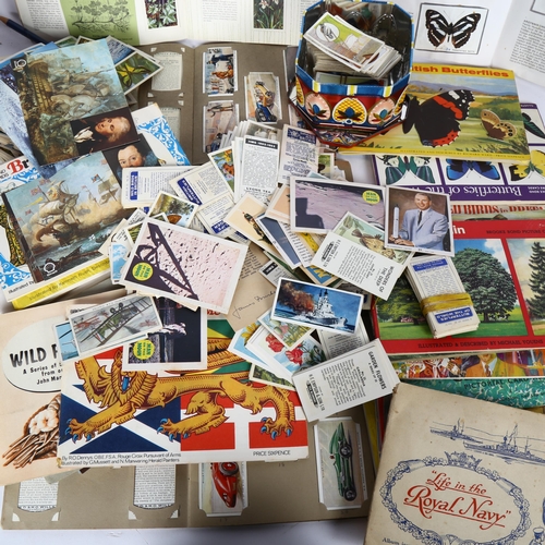 75 - Cigarette card albums, including Wills's with motorcars, Brooke Bond wild flowers, loose cigarette c... 