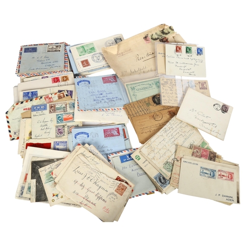 76 - A quantity of stamped envelopes, early 20th century to later