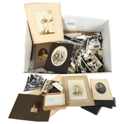 78 - A large quantity of black and white photographs and negatives, all Oriental related (boxful)