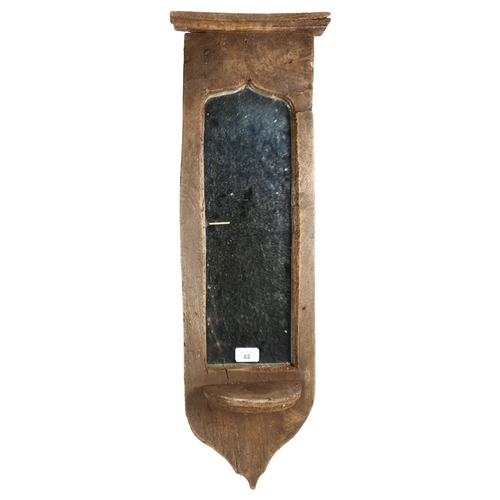 82 - A rustic design shield-shape wall mirror, L80cm