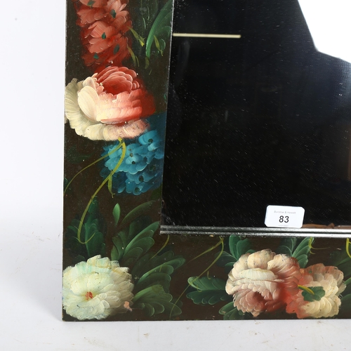 83 - A floral painted framed arch-top wall mirror, 45 x 78cm