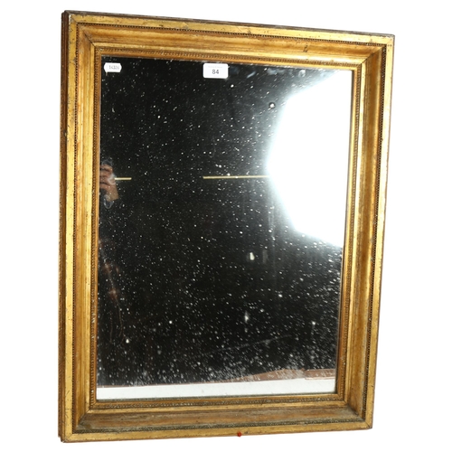 84 - An Antique gilt-framed wall mirror, 56 x 65cm