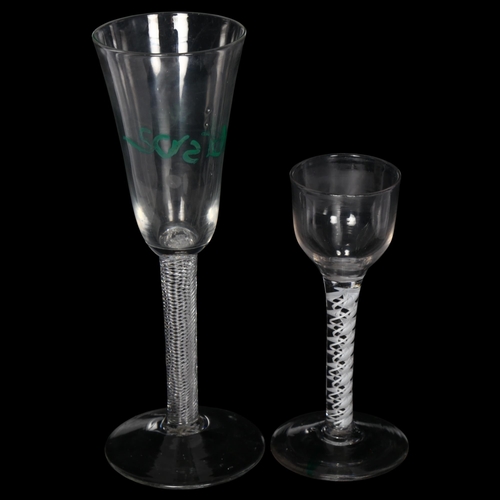 94 - 2 Georgian wine glasses, the tallest on an open air twist stem, the other having a milk twist stem, ... 