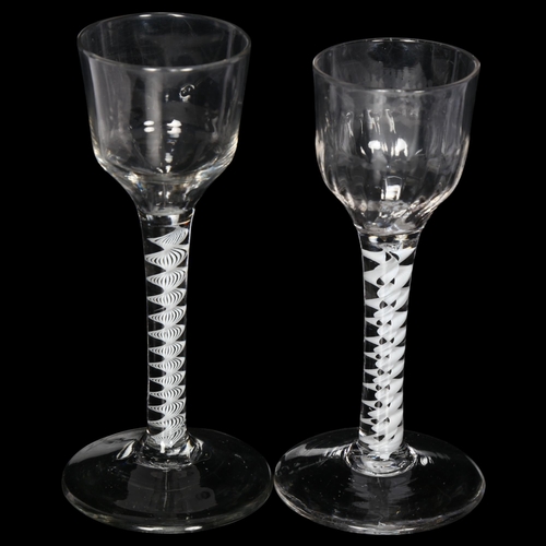 96 - 2 Georgian cordial glasses, 1 having a fluted bowl on a triple milk twist stem, H13.5cm, the other h... 