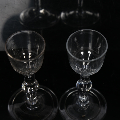 98 - 2 similar Georgian wine glasses with straight stems and single knops, both on folded foot, both H13.... 