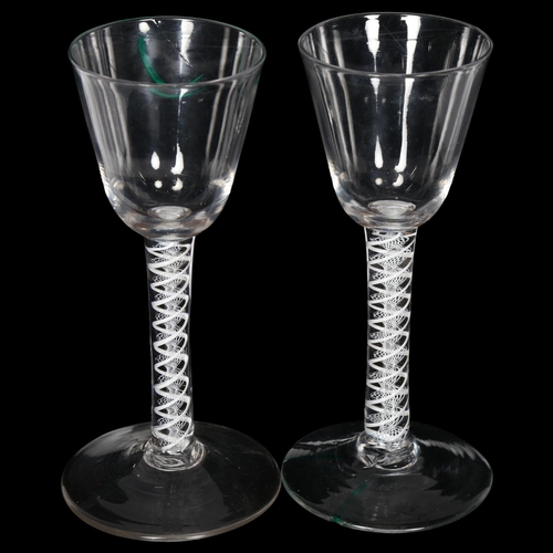 99 - A pair of Georgian wine glasses, with opaque spiral twist stems, H17cm