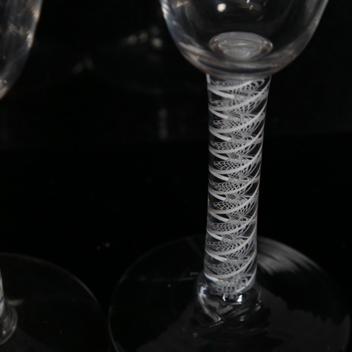 99 - A pair of Georgian wine glasses, with opaque spiral twist stems, H17cm