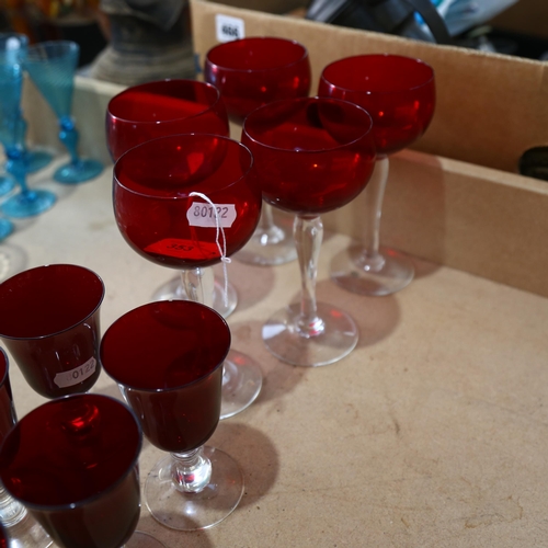 353 - A set of 12 ruby glass goblets on clear baluster stems, Hock glasses, 16.5cm etc