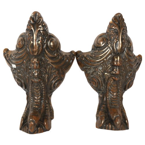 355 - A pair of large patinated cast-iron furniture feet, with claw and foliate design, 41cm