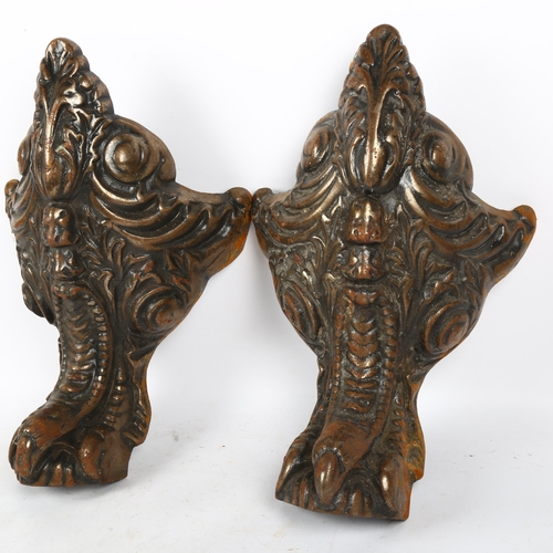 355 - A pair of large patinated cast-iron furniture feet, with claw and foliate design, 41cm