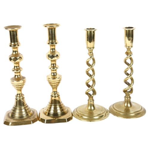 358 - A pair of brass open twist candlesticks, 26cm, and a pair of 19th century turned brass candlesticks