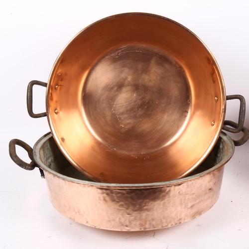 361 - 2 copper 2-handled jam pans, largest 50cm diameter, and a copper pan with iron swing handle (3)