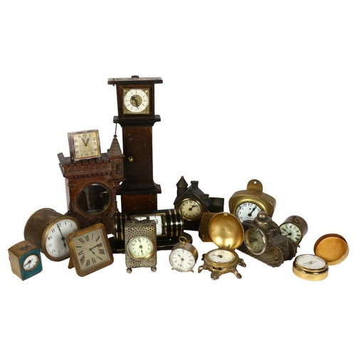 369 - A group of Vintage small clocks, including novelty tortoise clock, a tank clock, and 1 modelled as a... 