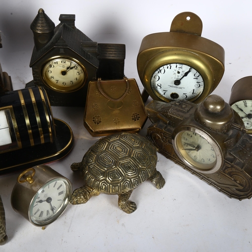 369 - A group of Vintage small clocks, including novelty tortoise clock, a tank clock, and 1 modelled as a... 