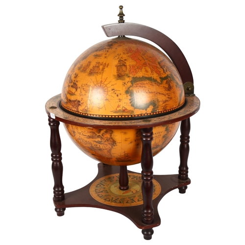 383 - A reproduction table-top globe drinks cabinet, height 56cm, diameter 41cm