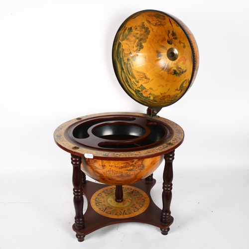 383 - A reproduction table-top globe drinks cabinet, height 56cm, diameter 41cm