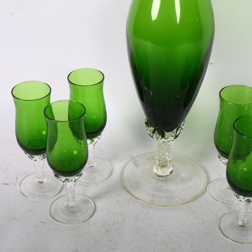 392 - A Continental green glass liqueur set, jug height 43cm