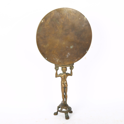 412 - A circular brass bevel-edge mirror with figure support, H40cm