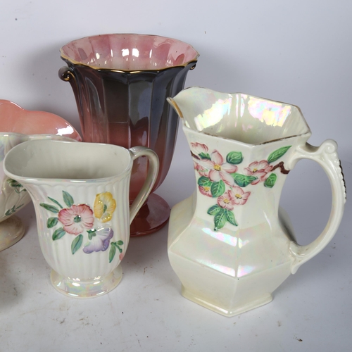 419 - A group of Malingware, including a pink vase, 21.5cm, a pair of hexagonal jugs etc