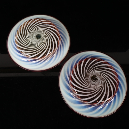 424 - A pair of pink and vaseline glass shallow dishes, width 20cm