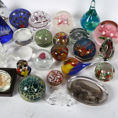 431 - A collection of glass paperweights, including Caithness and Mdina